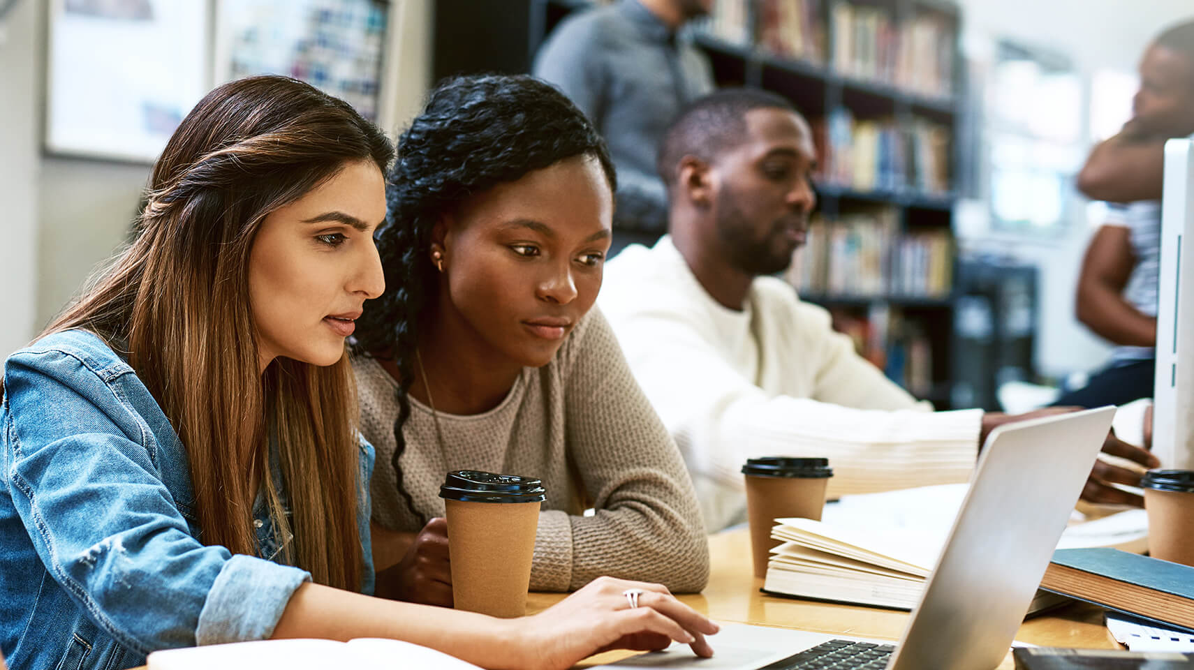 women looking at computer