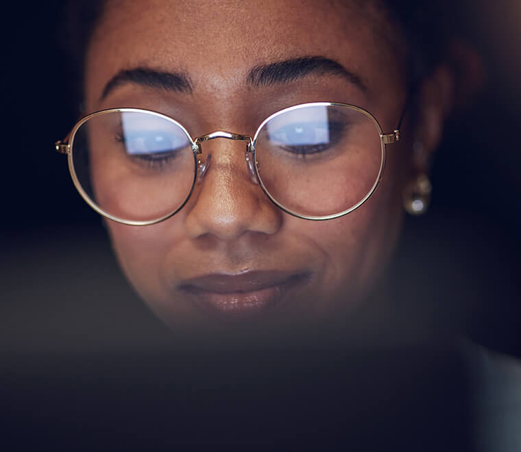 woman looking at computer